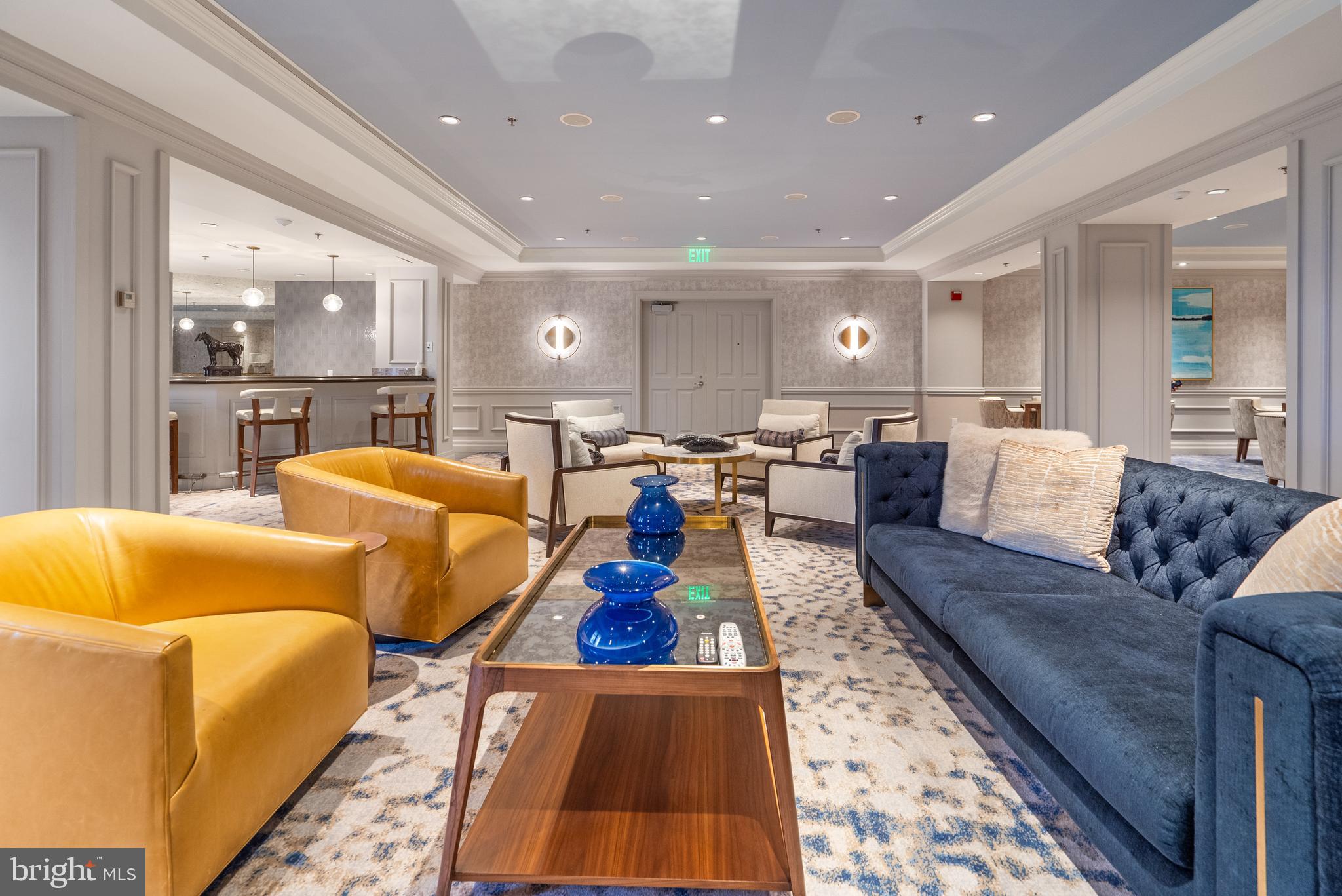 801 Key Highway, Unit 345 Baltimore, MD 21230 - Photo 49 of 57 a living room with furniture and a rug