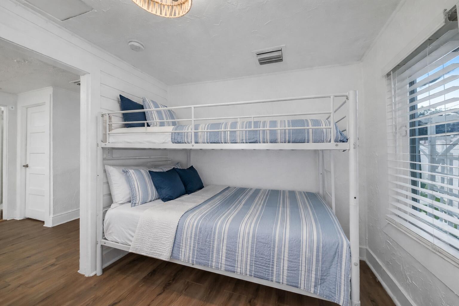 308 Southwest 1st Street Delray Beach, FL 33444 - Photo 15 of 26 a bedroom with a bed and a window