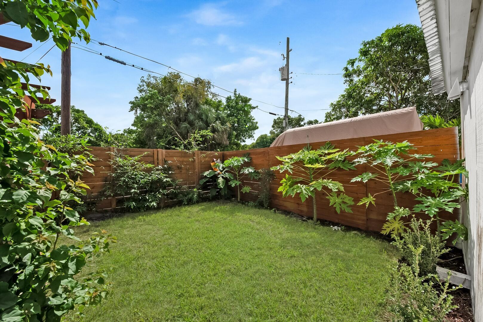 308 Southwest 1st Street Delray Beach, FL 33444 - Photo 18 of 26 a view of a garden with an outdoor space
