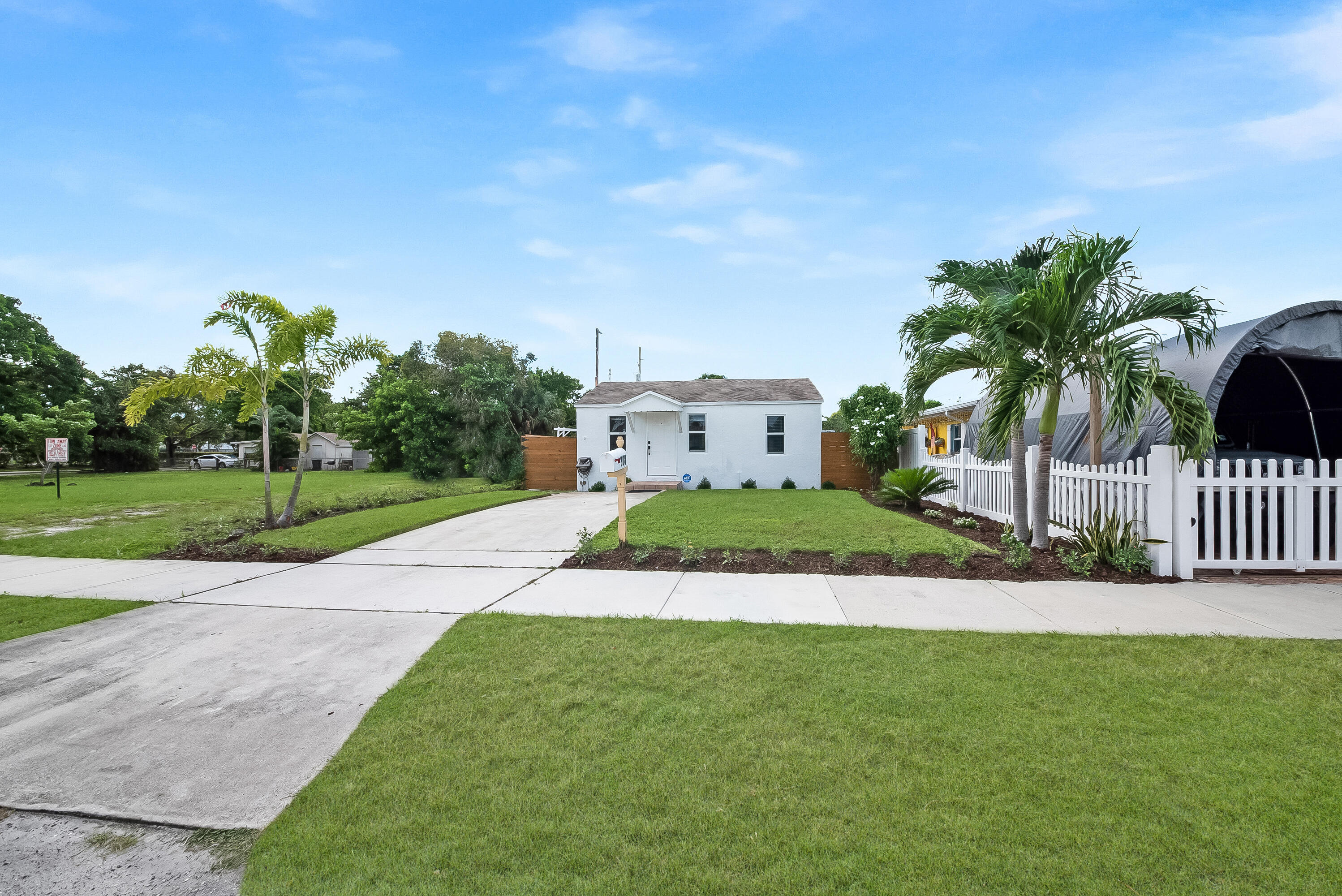 308 Southwest 1st Street Delray Beach, FL 33444 - Photo 25 of 26 a view of a house with a yard