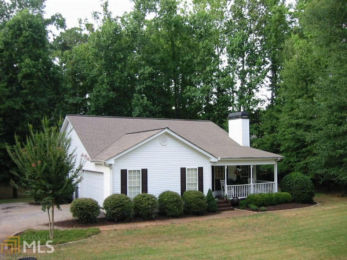 710 Old Pendergrass Road Jefferson, GA 30549 - Photo 1 of 1 a front view of a house with a garden