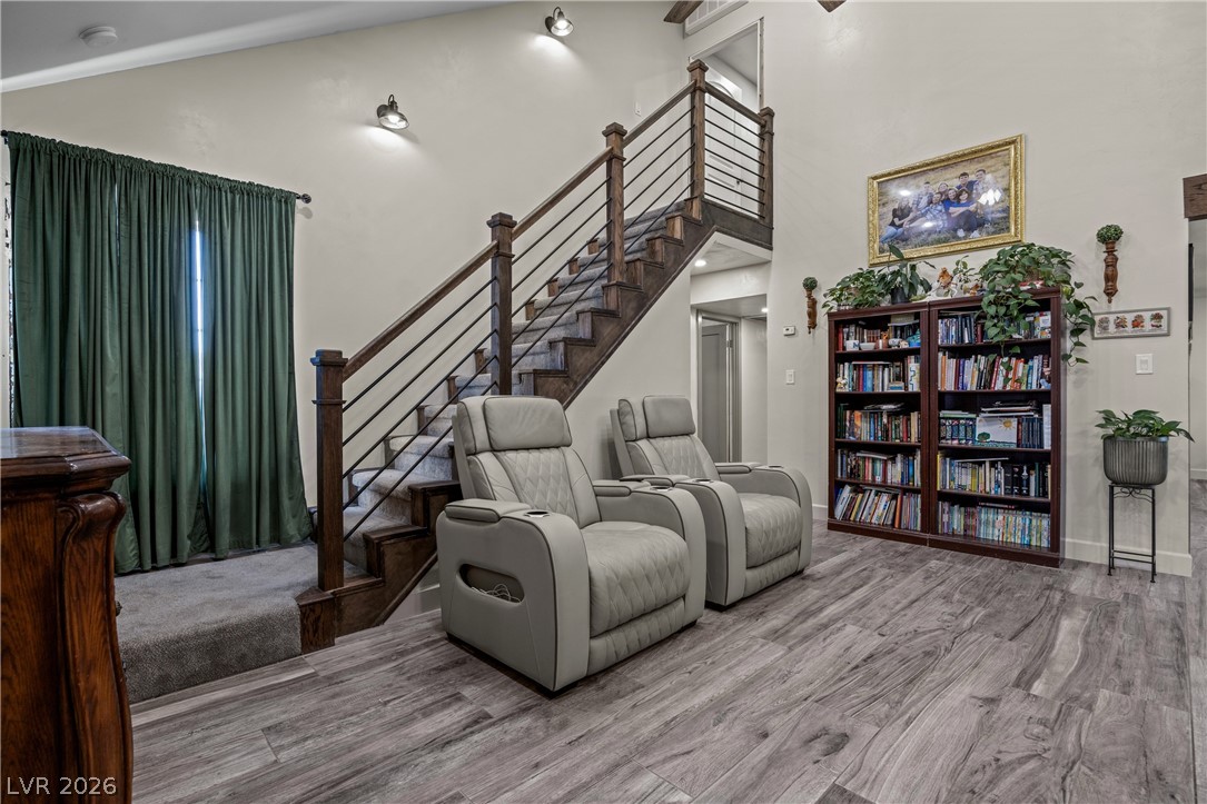 750 Leming Avenue Overton, NV 89040 - Photo 14 of 82 This inviting space features a grand staircase and stylish flooring, perfect for comfortable living.