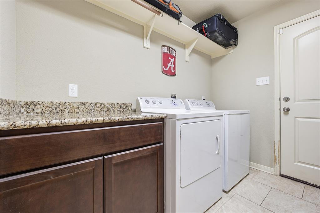 10808 Aurora Drive Waco, TX 76708 - Photo 20 of 23 a utility room with dryer and washer