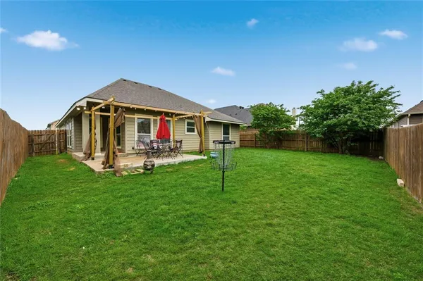 a house view with a garden space