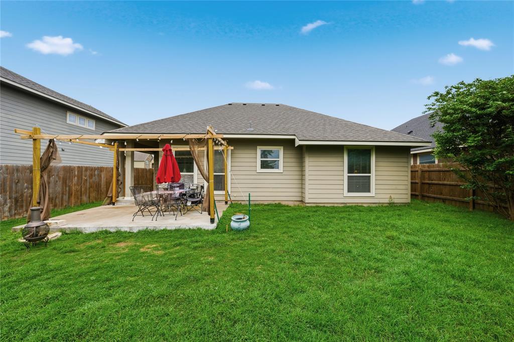 10808 Aurora Drive Waco, TX 76708 - Photo 22 of 23 a view of a house with backyard porch and sitting area