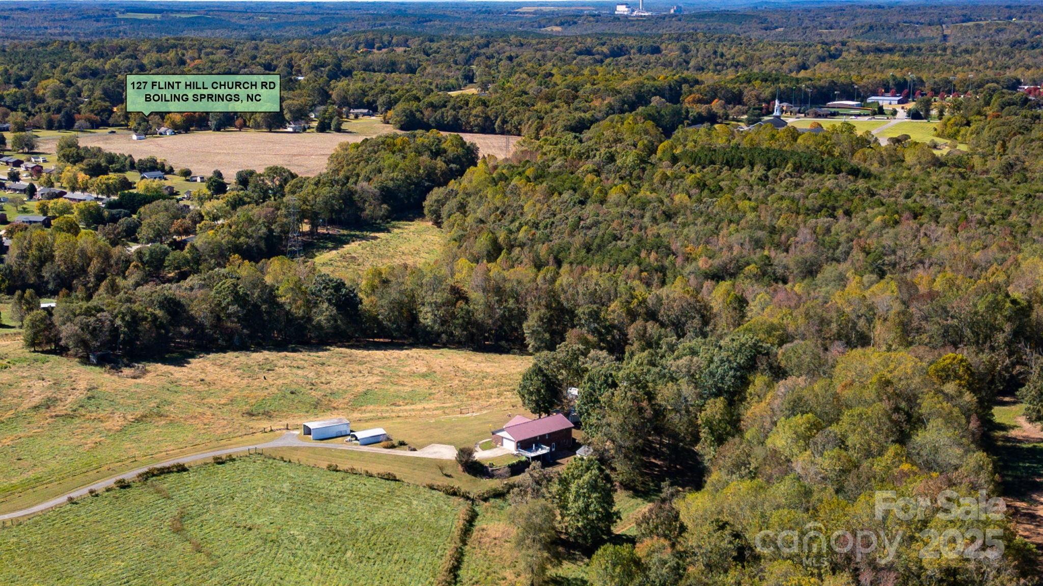 125 Flint Hill Church Road Shelby, NC 28152 - Photo 8 of 13 a view of a houses with a yard