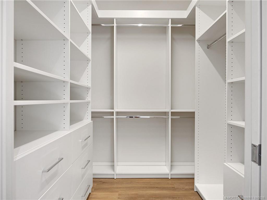41 Southwest Seminole Street, Unit 208 Stuart, FL 34994 - Photo 24 of 46 a view of an empty walk in closet