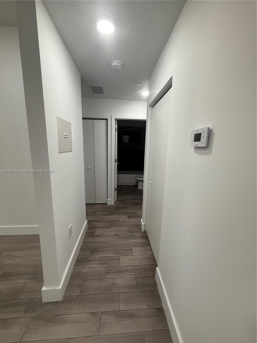 486 East 30th Street, Unit 202 Hialeah, FL 33013 - Photo 5 of 16 a view of a hallway