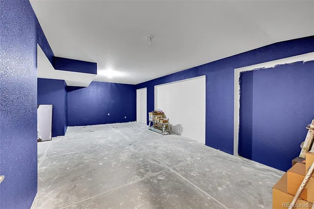 a view of a livingroom with a staircase