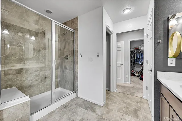 a bathroom with a shower and a bathtub