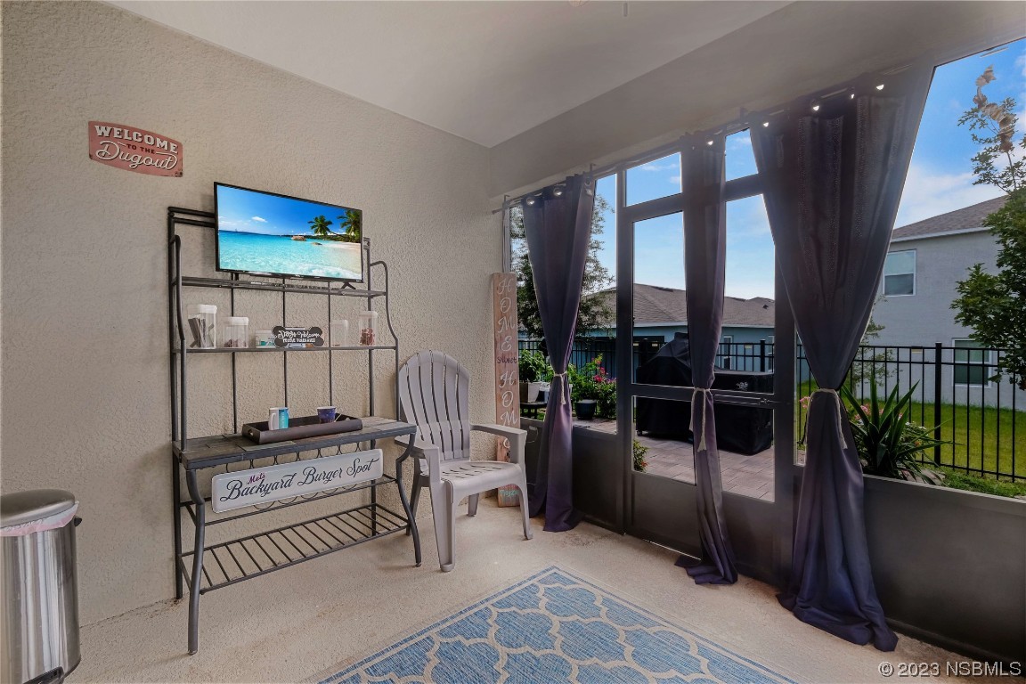 354 Camilla Road DeLand, FL 32724 - Photo 33 of 57 a bedroom with furniture and large window