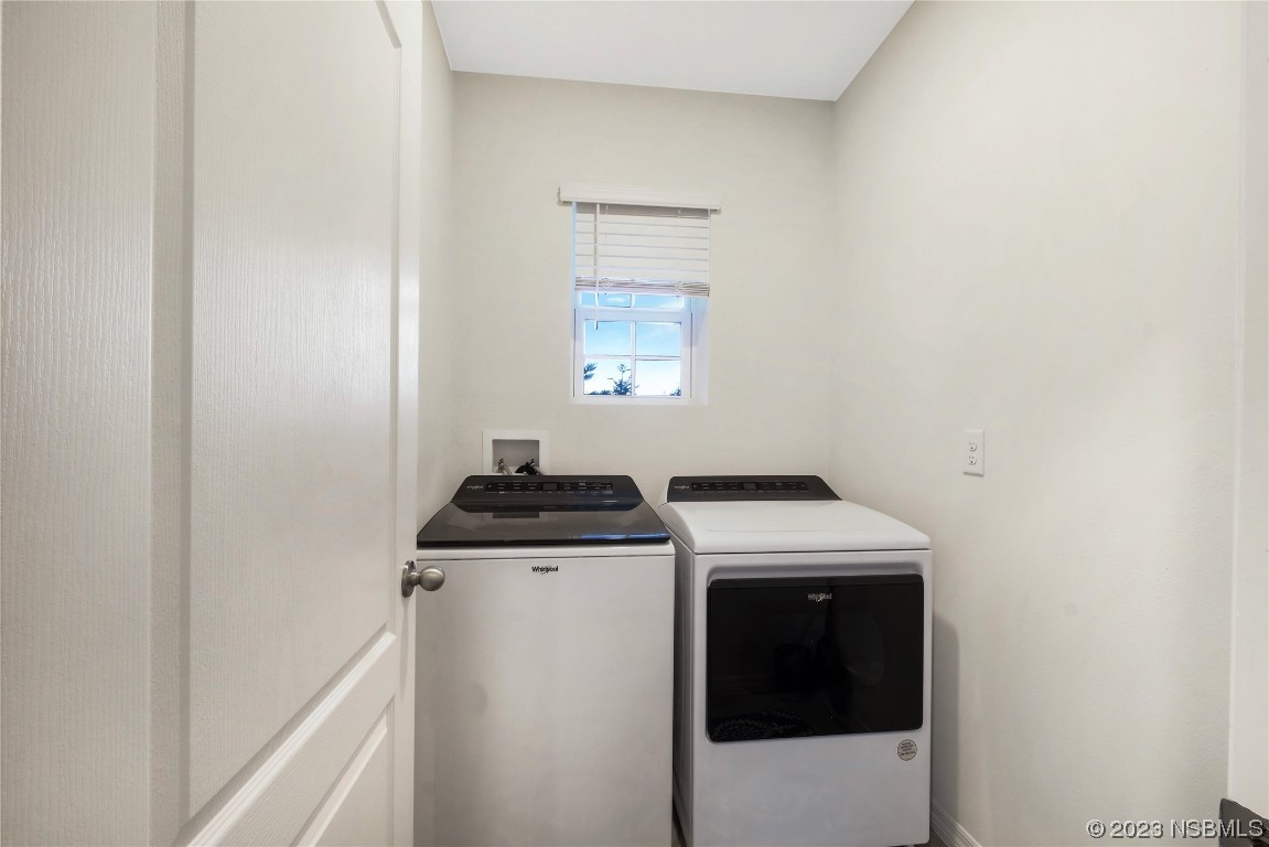 354 Camilla Road DeLand, FL 32724 - Photo 36 of 57 a utility room with dryer and washer