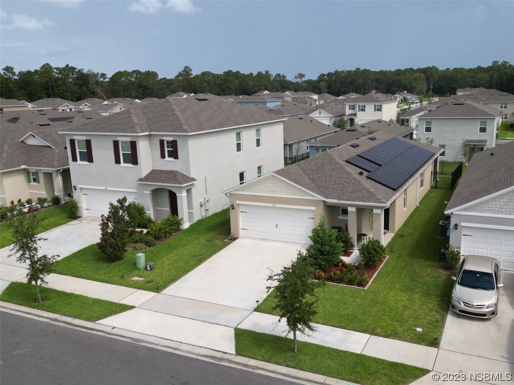 354 Camilla Road DeLand, FL 32724 - Photo 42 of 57 an aerial view of residential houses with outdoor space and street view