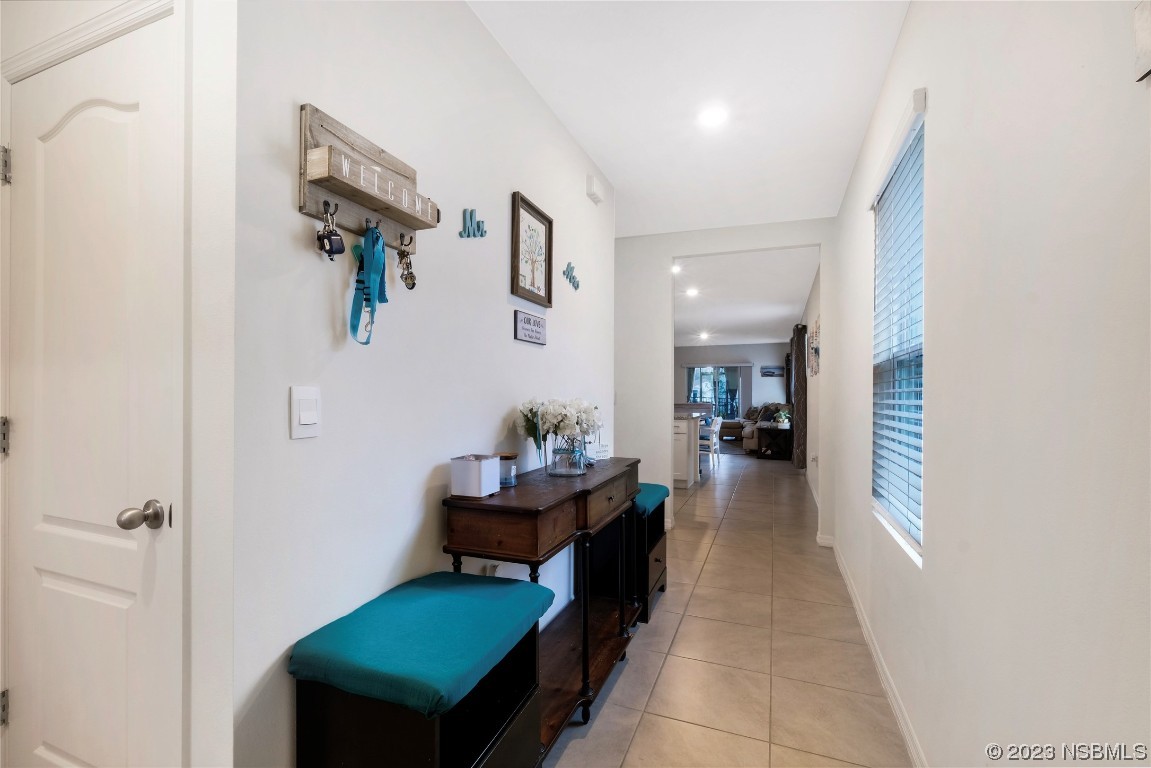 354 Camilla Road DeLand, FL 32724 - Photo 5 of 57 a living room with furniture and a table