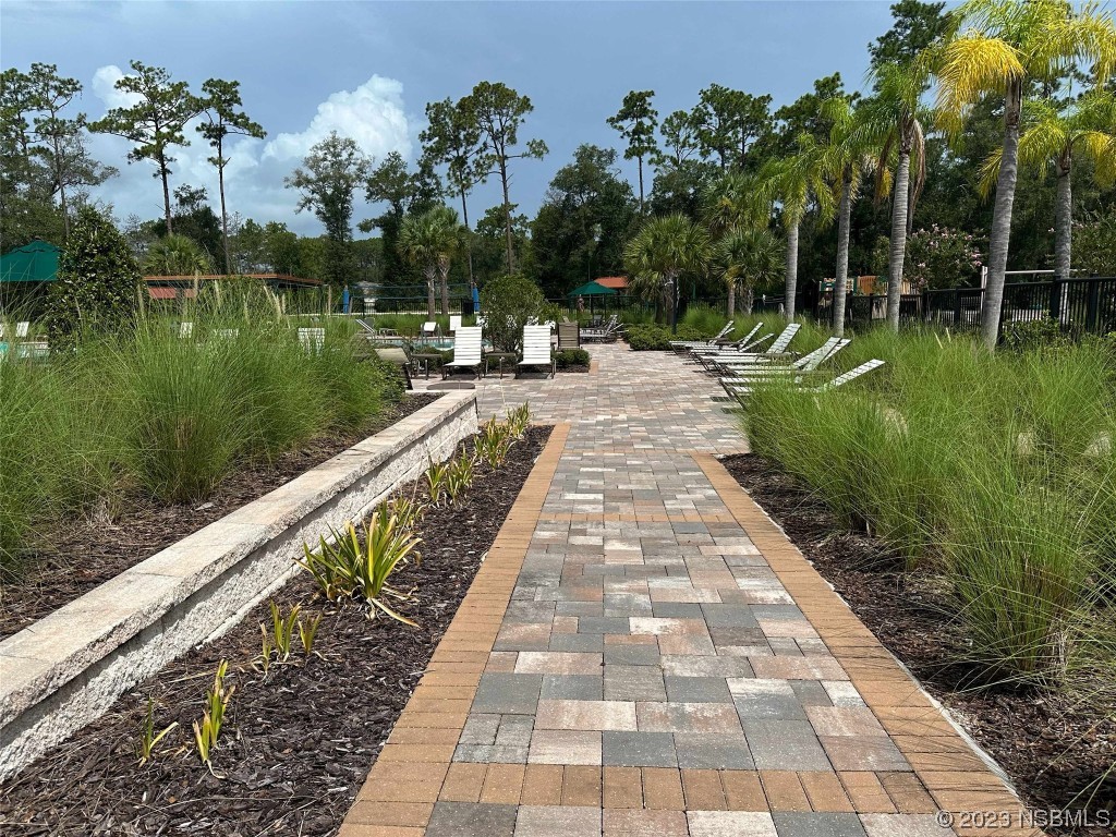 354 Camilla Road DeLand, FL 32724 - Photo 54 of 57 a view of flowing water with a fountain in the background