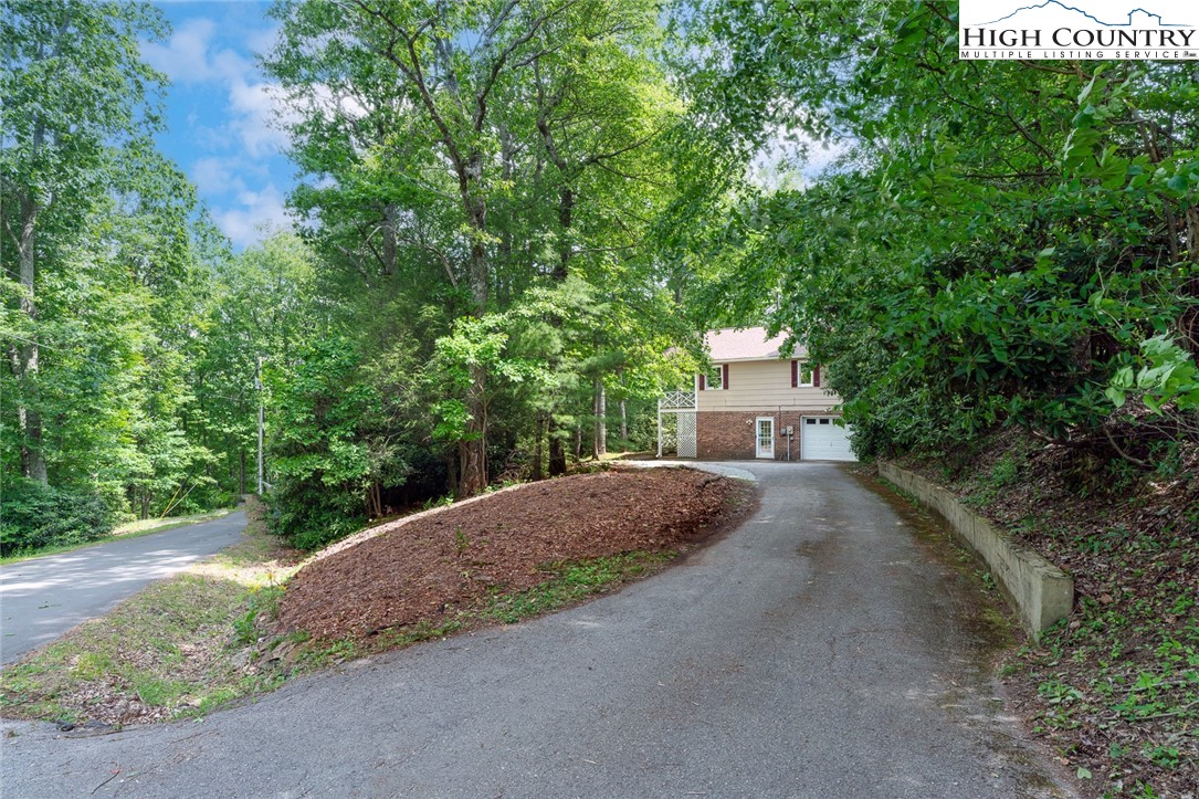 168 Trillium Ridge Boone, NC 28607 - Photo 36 of 36 a house view with a outdoor space