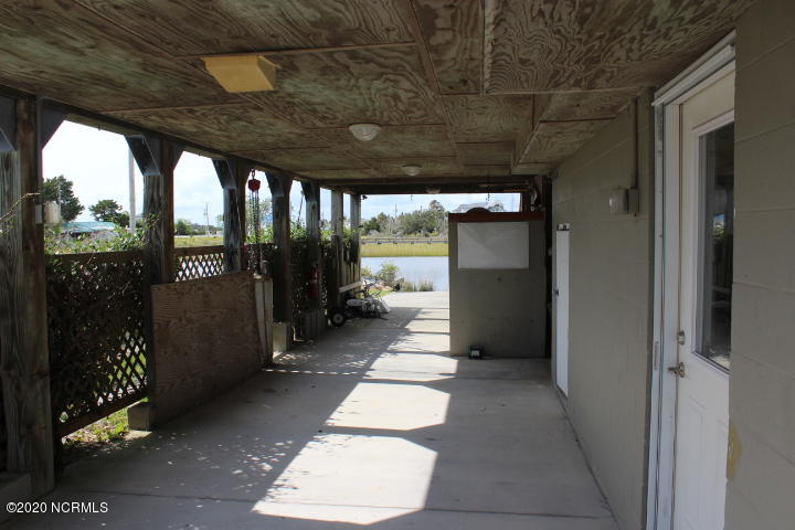 113 Cedar Lane Cedar Point, NC 28584 - Photo 44 of 52 Car Port/door open to rec room