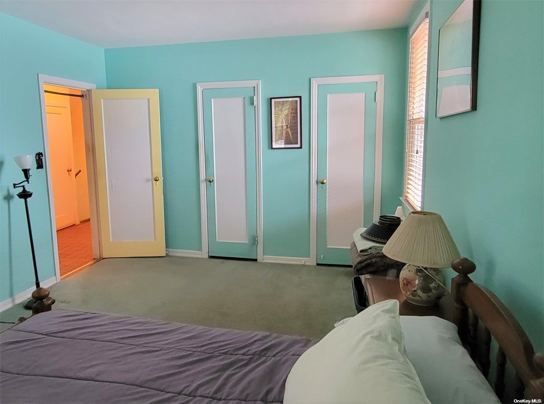 138 Hewlett Avenue Merrick, NY 11566 - Photo 21 of 35 a living room with furniture and a window