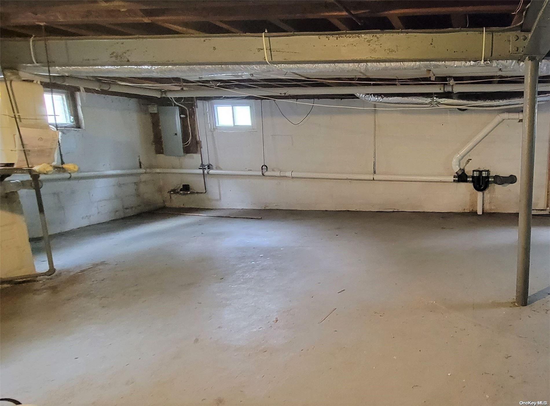 138 Hewlett Avenue Merrick, NY 11566 - Photo 28 of 35 a view of a room with gym equipment