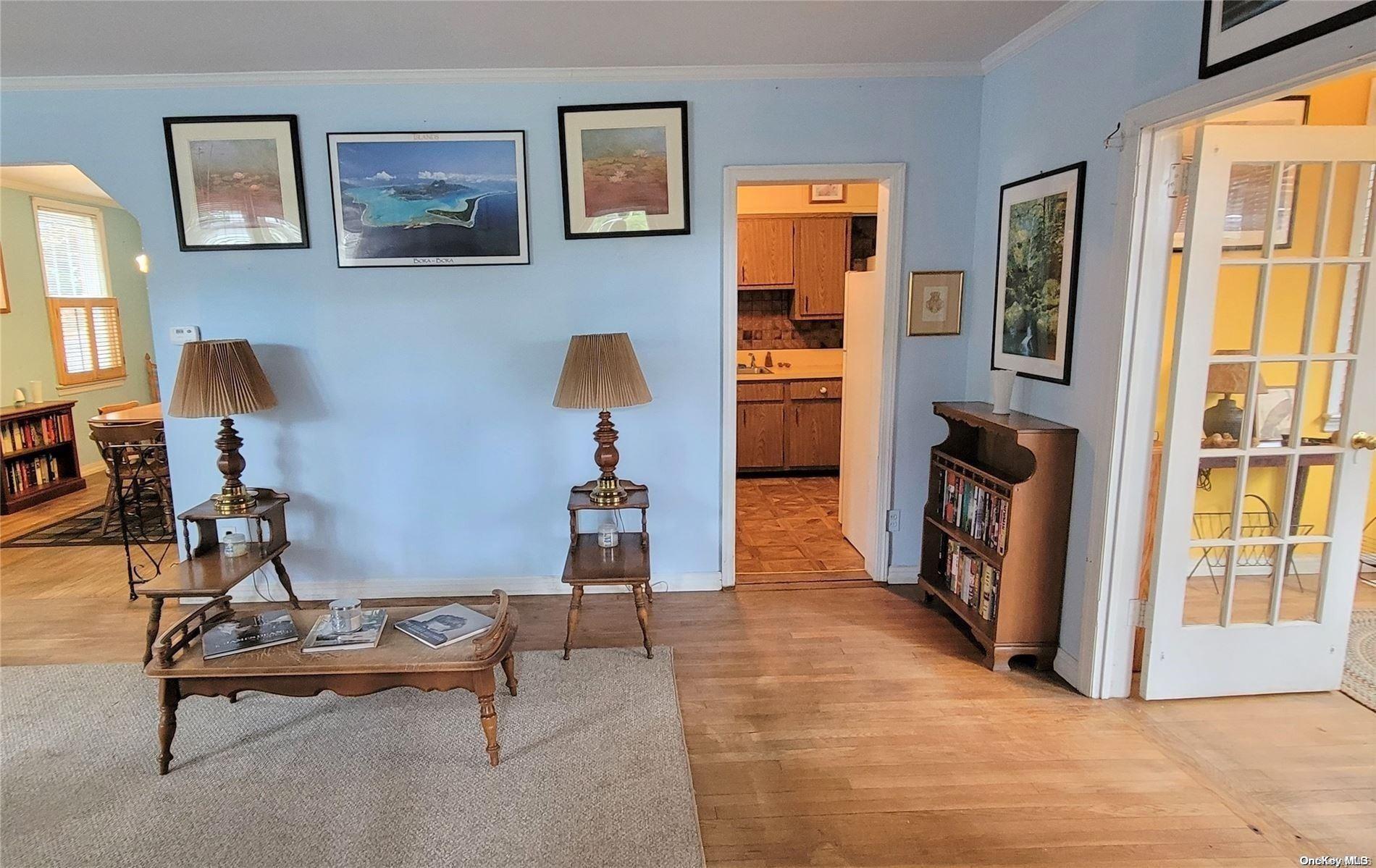 138 Hewlett Avenue Merrick, NY 11566 - Photo 3 of 35 a view of a livingroom with furniture and a window