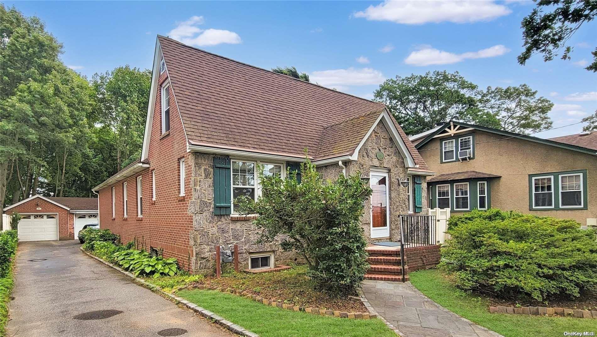 138 Hewlett Avenue Merrick, NY 11566 - Photo 35 of 35 front view of a house with a yard
