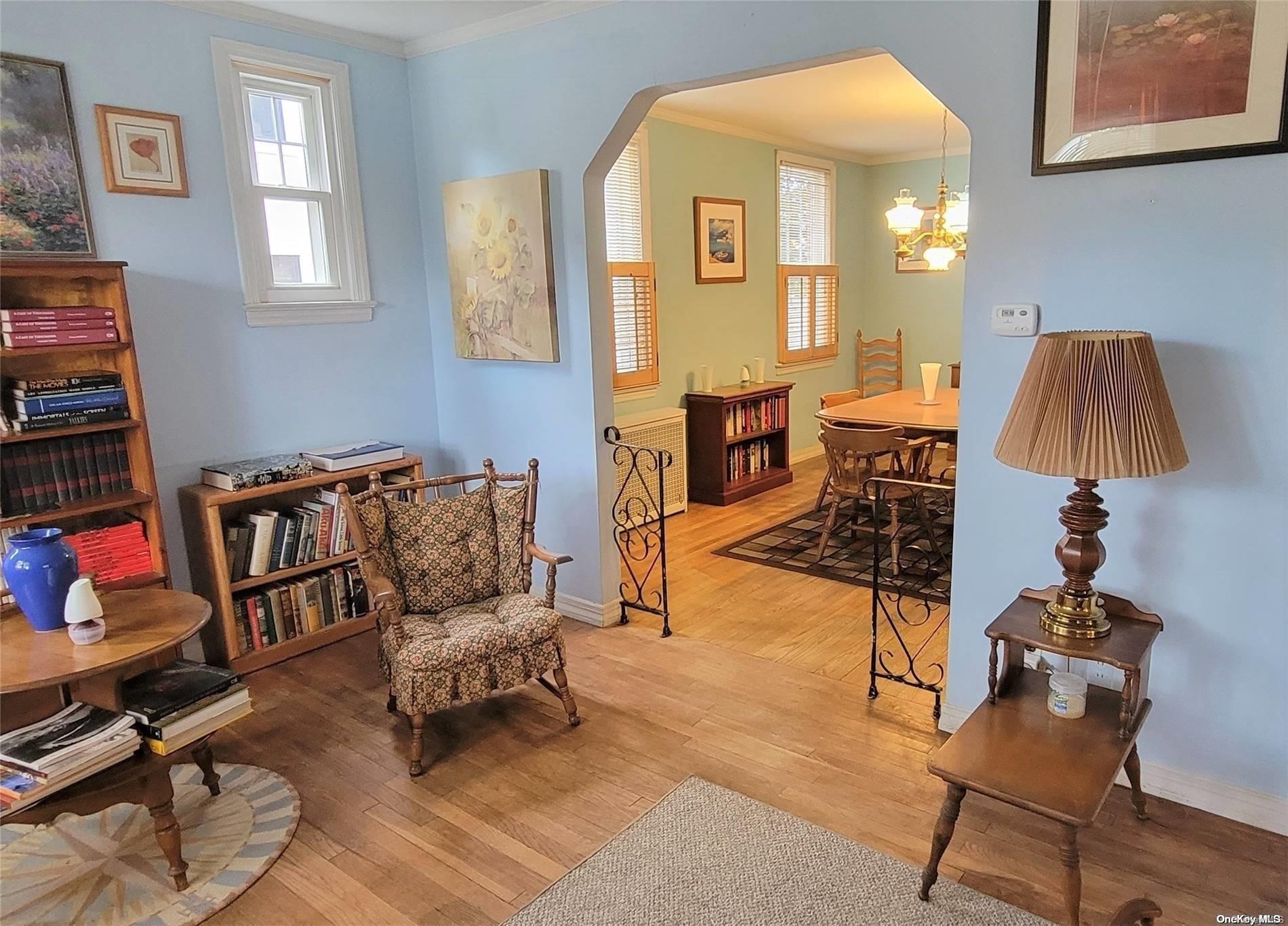 138 Hewlett Avenue Merrick, NY 11566 - Photo 4 of 35 a living room with furniture and a window