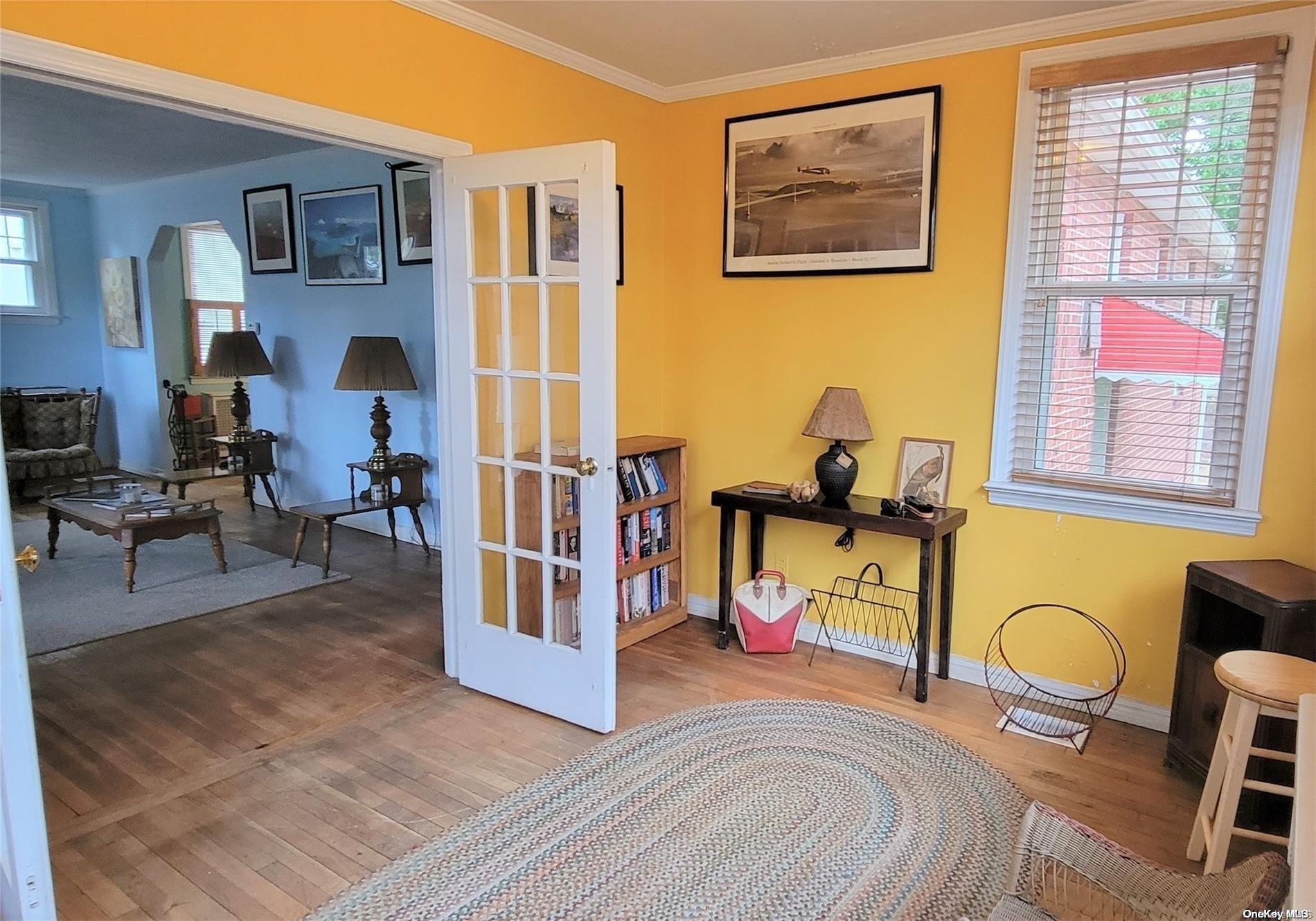 138 Hewlett Avenue Merrick, NY 11566 - Photo 8 of 35 a view of a livingroom with furniture workspace and a window