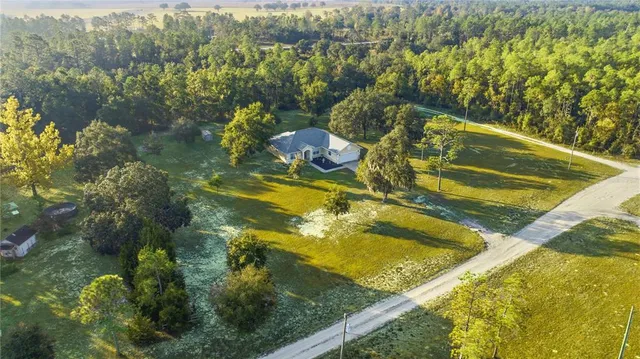 a view of a swimming pool and an outdoor space