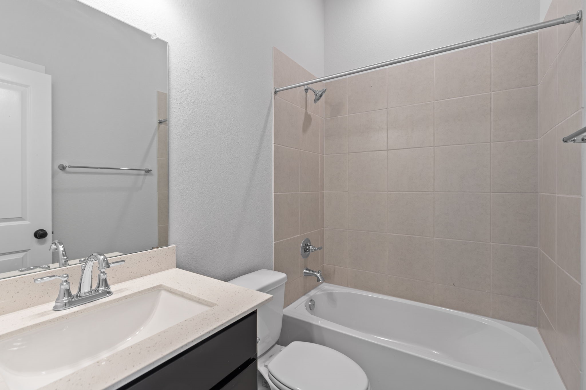 10919 Middle Rdg Drive Missouri City, TX 77459 - Photo 17 of 43 a bathroom with a sink toilet and bathtub