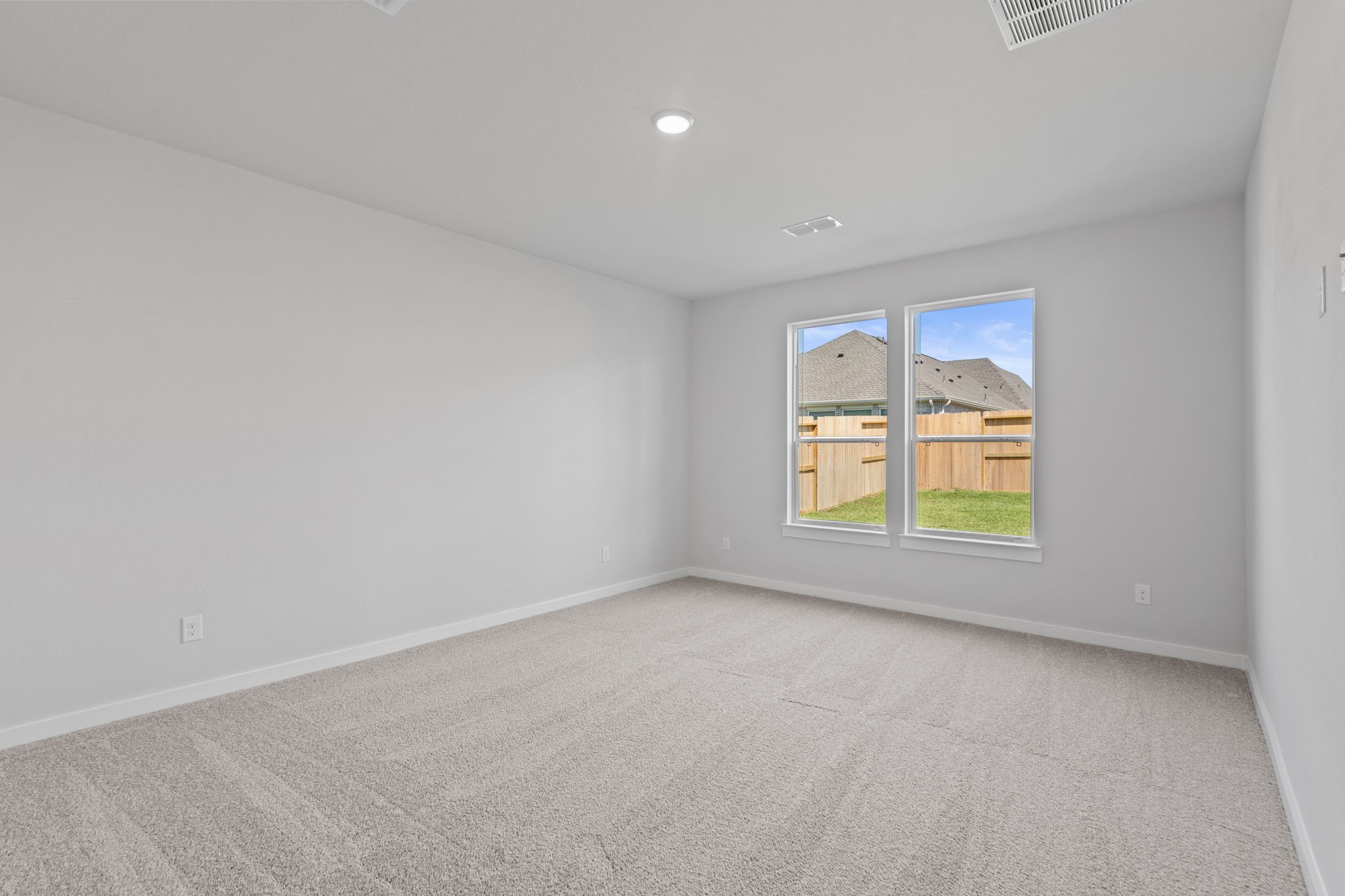 10919 Middle Rdg Drive Missouri City, TX 77459 - Photo 19 of 43 an empty room with windows