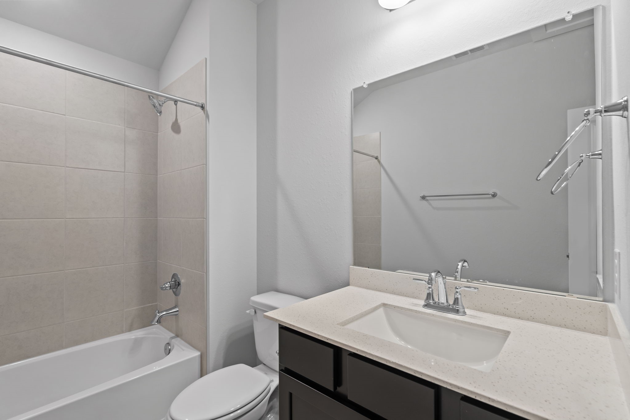 10919 Middle Rdg Drive Missouri City, TX 77459 - Photo 29 of 43 a bathroom with a sink toilet vanity and shower