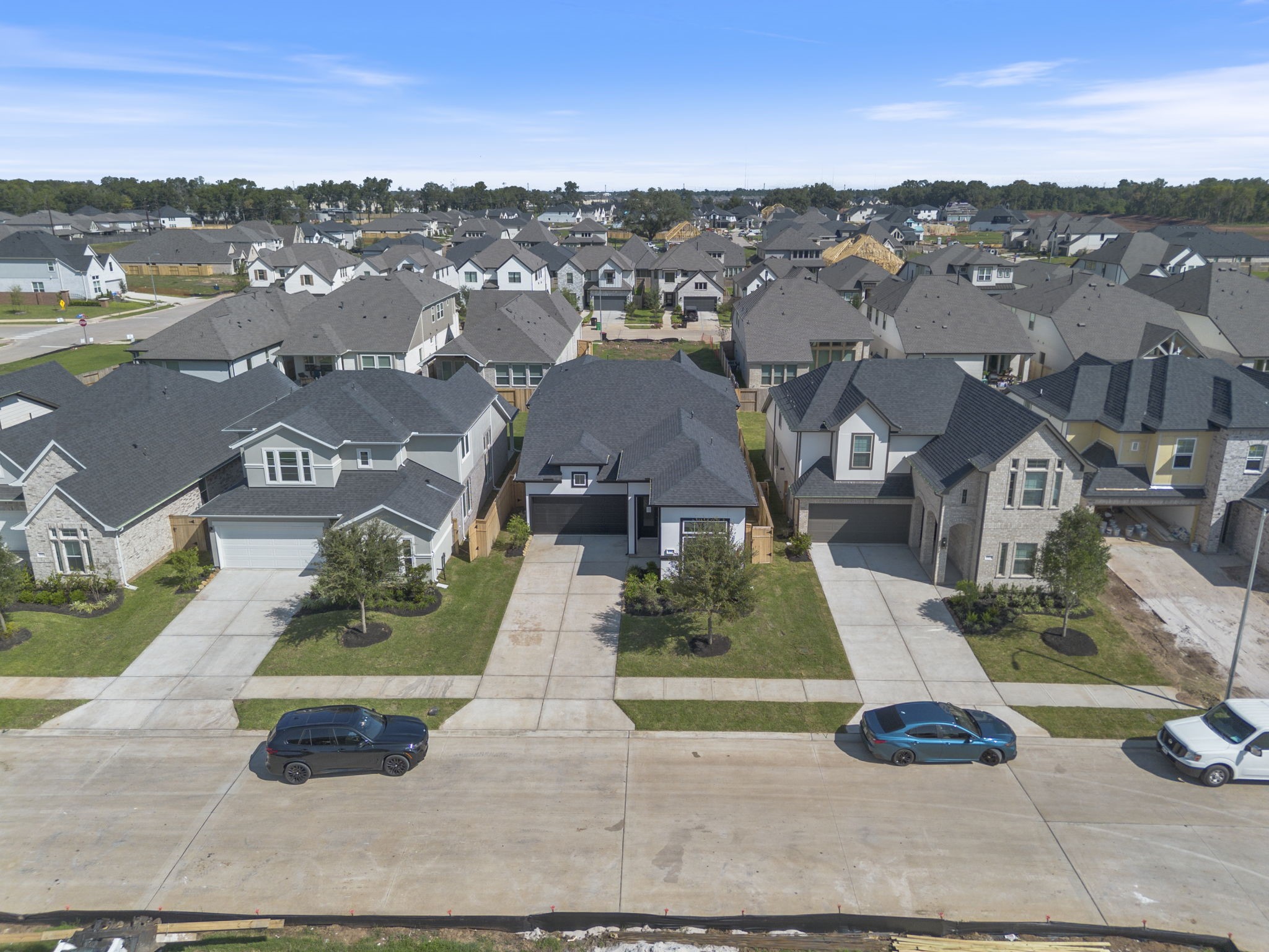 10919 Middle Rdg Drive Missouri City, TX 77459 - Photo 3 of 43 an aerial view of a house with a garden and lake view