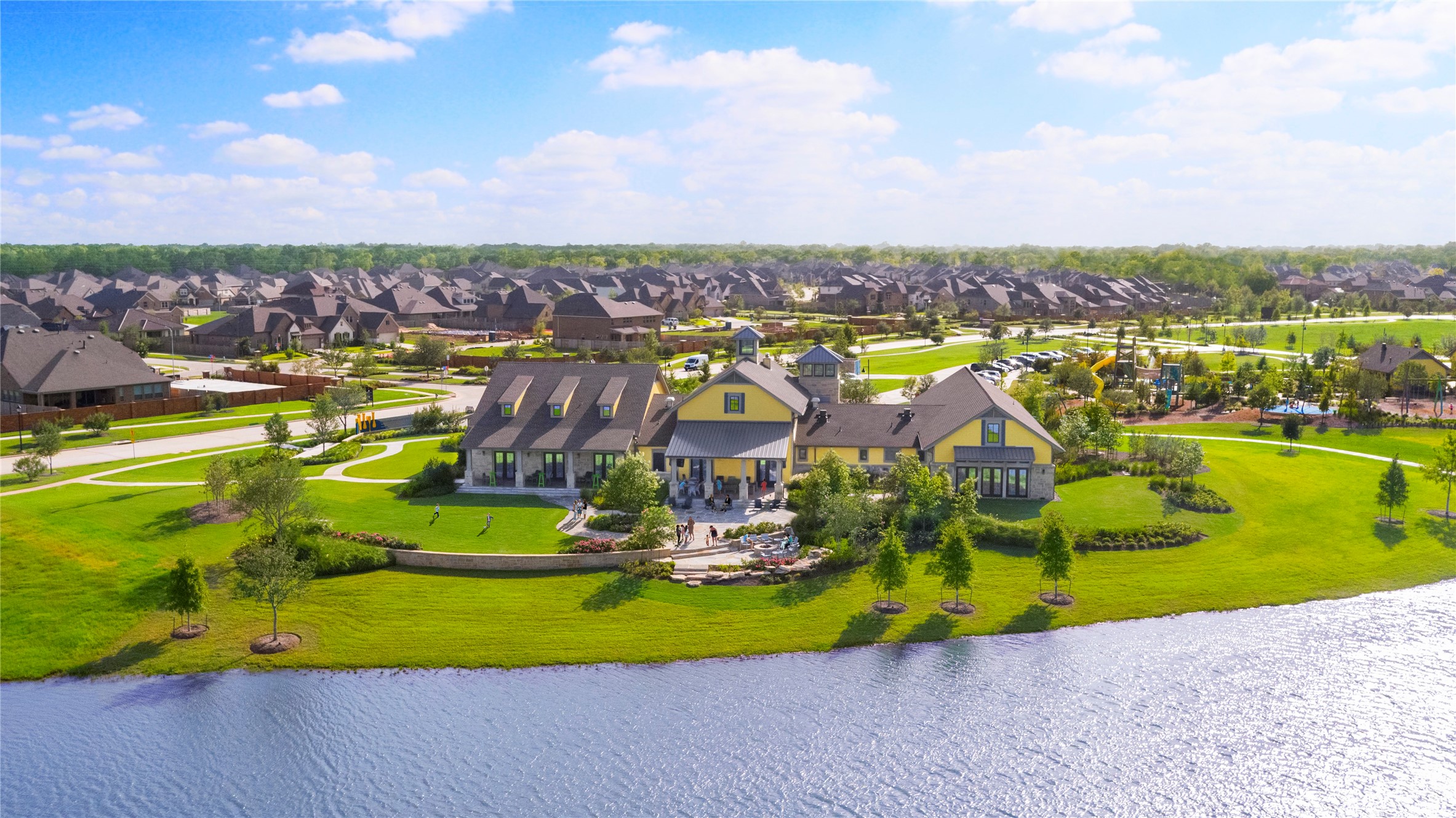 10919 Middle Rdg Drive Missouri City, TX 77459 - Photo 39 of 43 an aerial view of a house with a garden and lake view