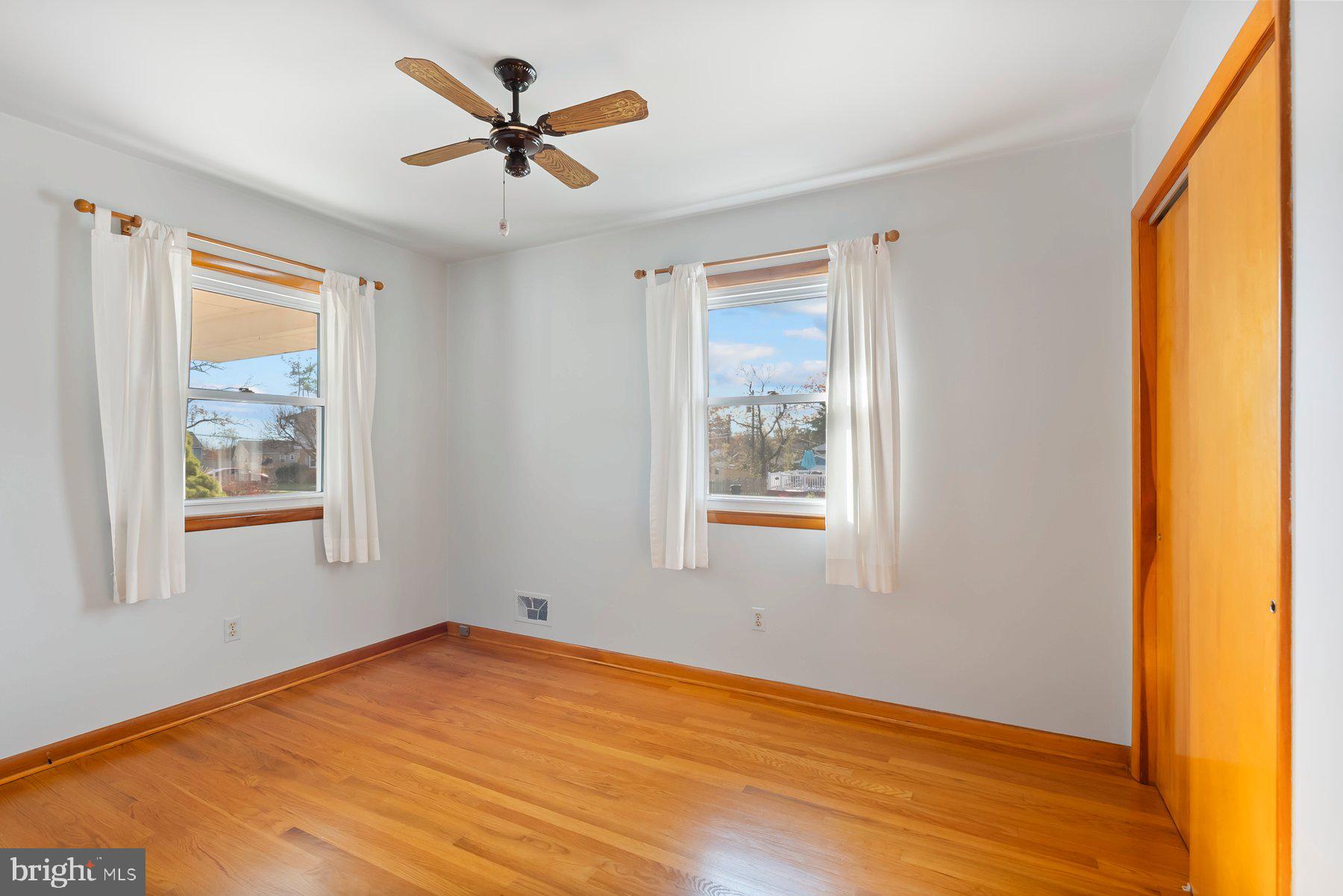 8301 Overmont Road Baltimore, MD 21234 - Photo 19 of 28 a view of a room with window and wooden floor