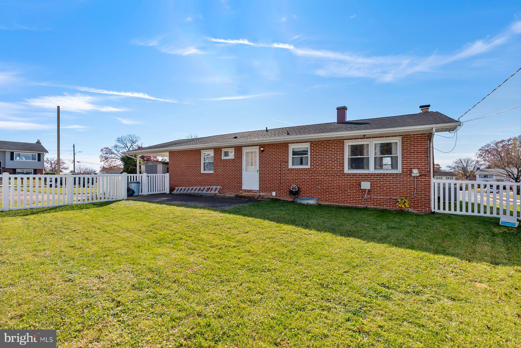 8301 Overmont Road Baltimore, MD 21234 - Photo 28 of 28 a front view of a house with swimming pool