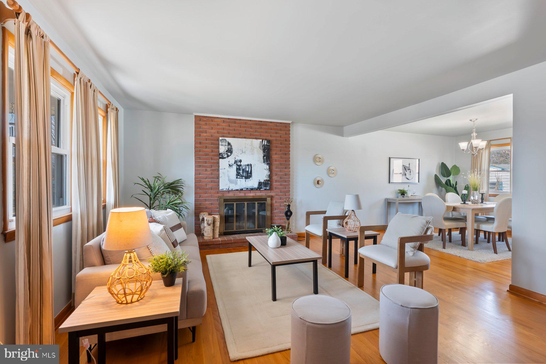8301 Overmont Road Baltimore, MD 21234 - Photo 4 of 28 a living room with furniture and wooden floor