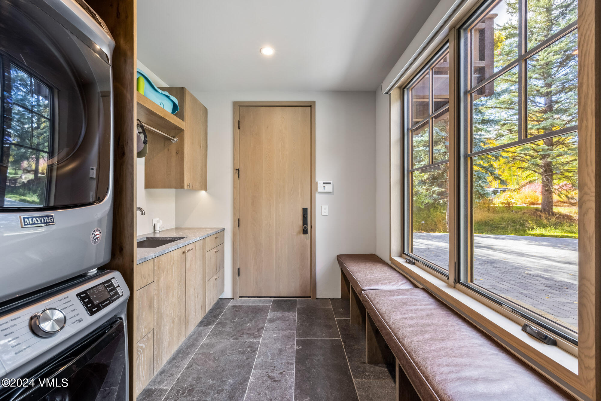 1022 Eagles Nest Circle Vail, CO 81657 - Photo 33 of 41 a view of a kitchen with stainless steel appliances granite countertop a stove and a window