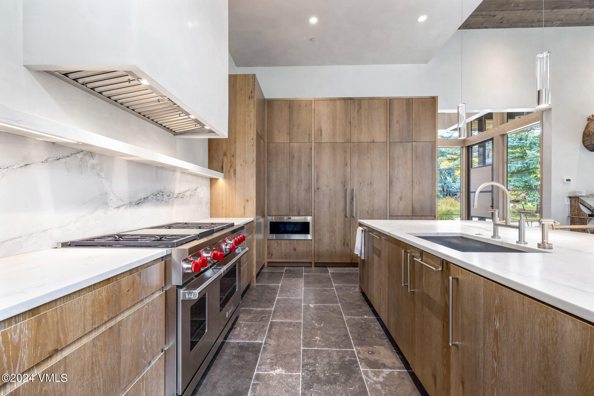 1022 Eagles Nest Circle Vail, CO 81657 - Photo 10 of 41 a kitchen with a stove and a sink
