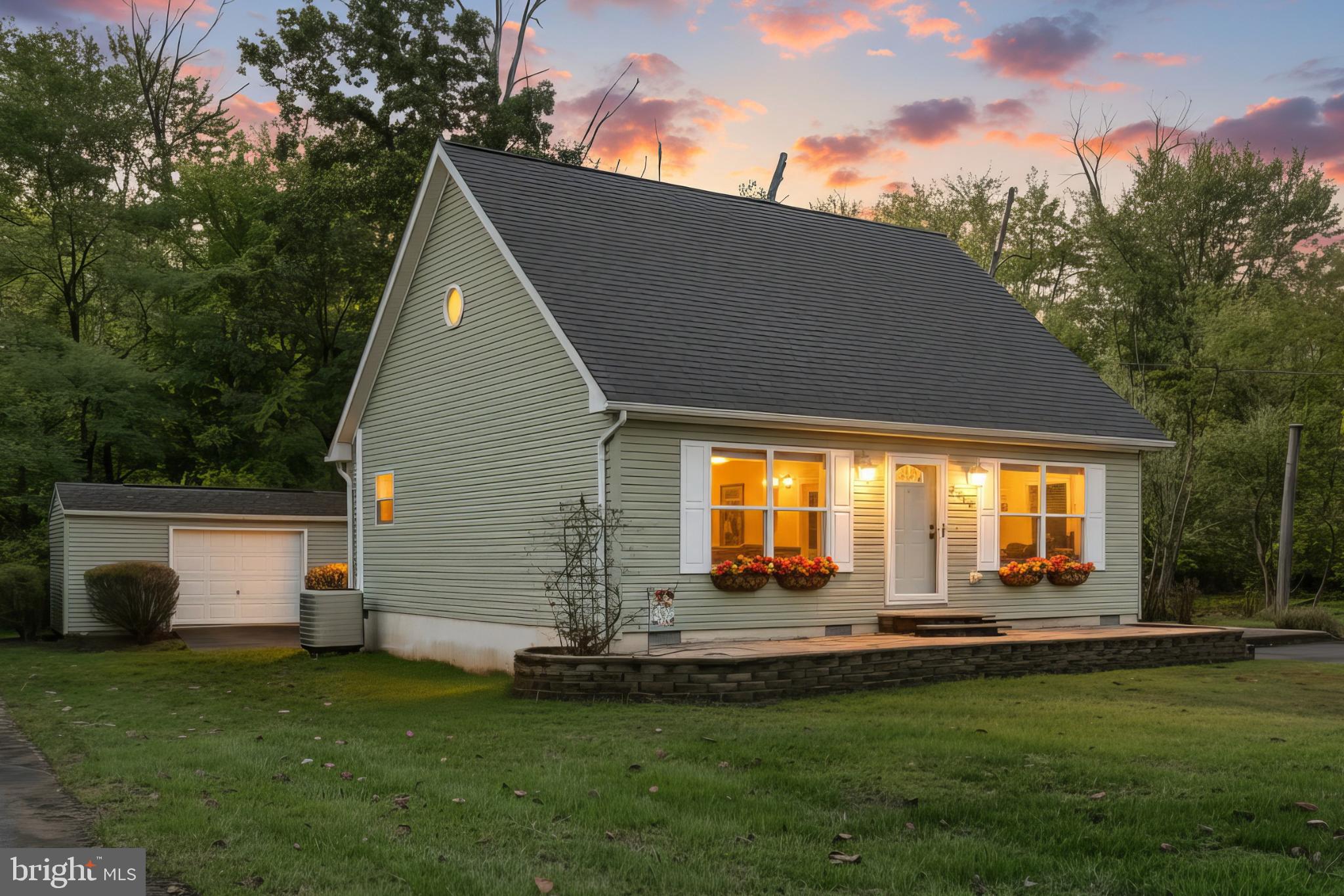 4105 Smith Road Dover, PA 17315 - Photo 1 of 28 Charming home bathed in sunset glow.