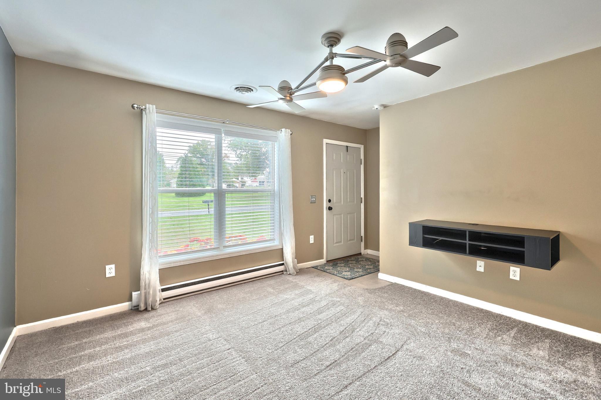 4105 Smith Road Dover, PA 17315 - Photo 11 of 28 Bright and inviting living space awaits you.