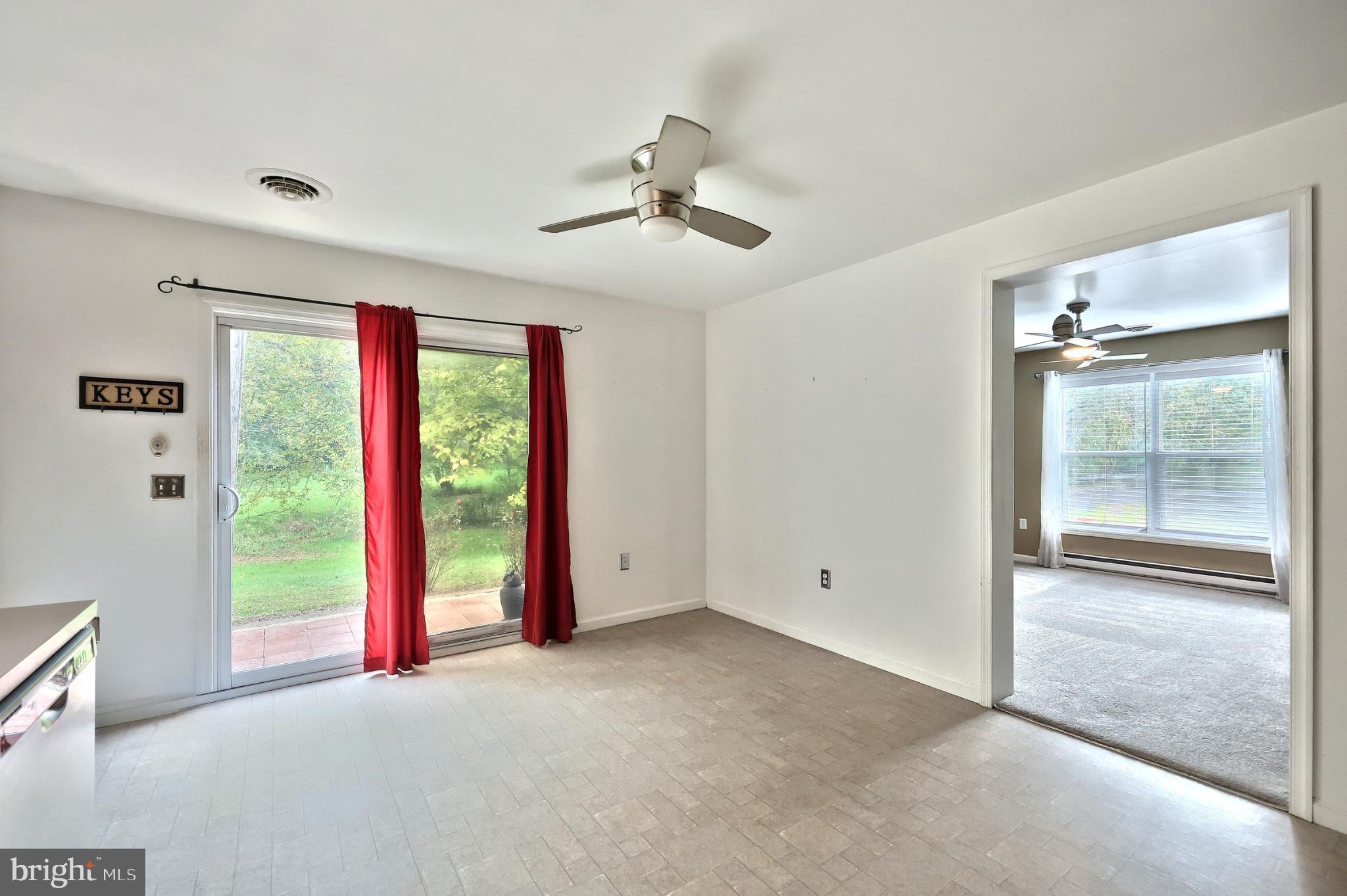 4105 Smith Road Dover, PA 17315 - Photo 13 of 28 Bright and airy living space with outdoor view.