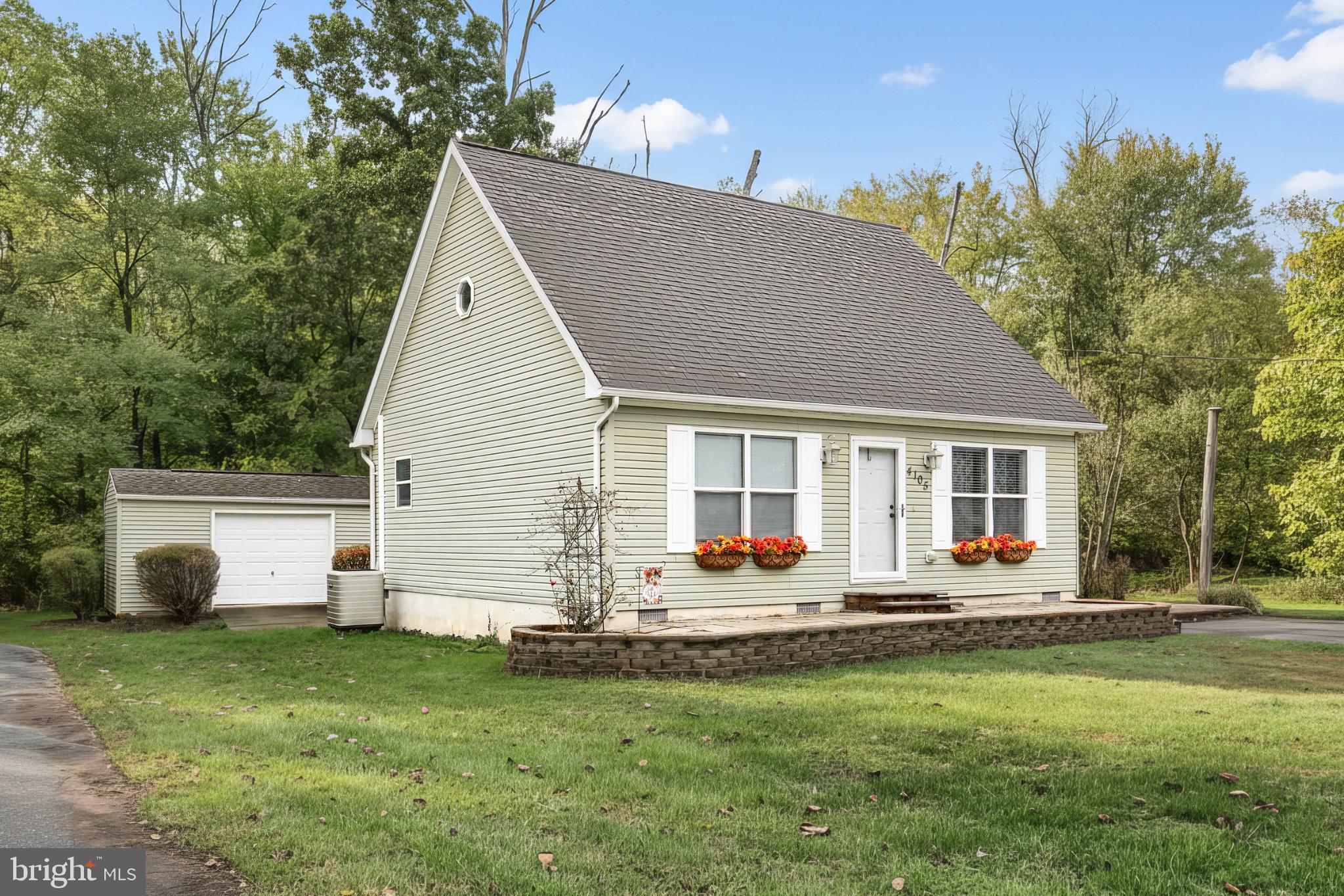 4105 Smith Road Dover, PA 17315 - Photo 3 of 28 Charming home nestled in serene greenery.