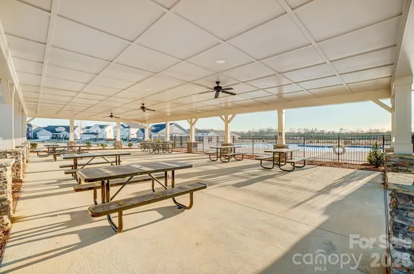 a view of a swimming pool and outdoor space