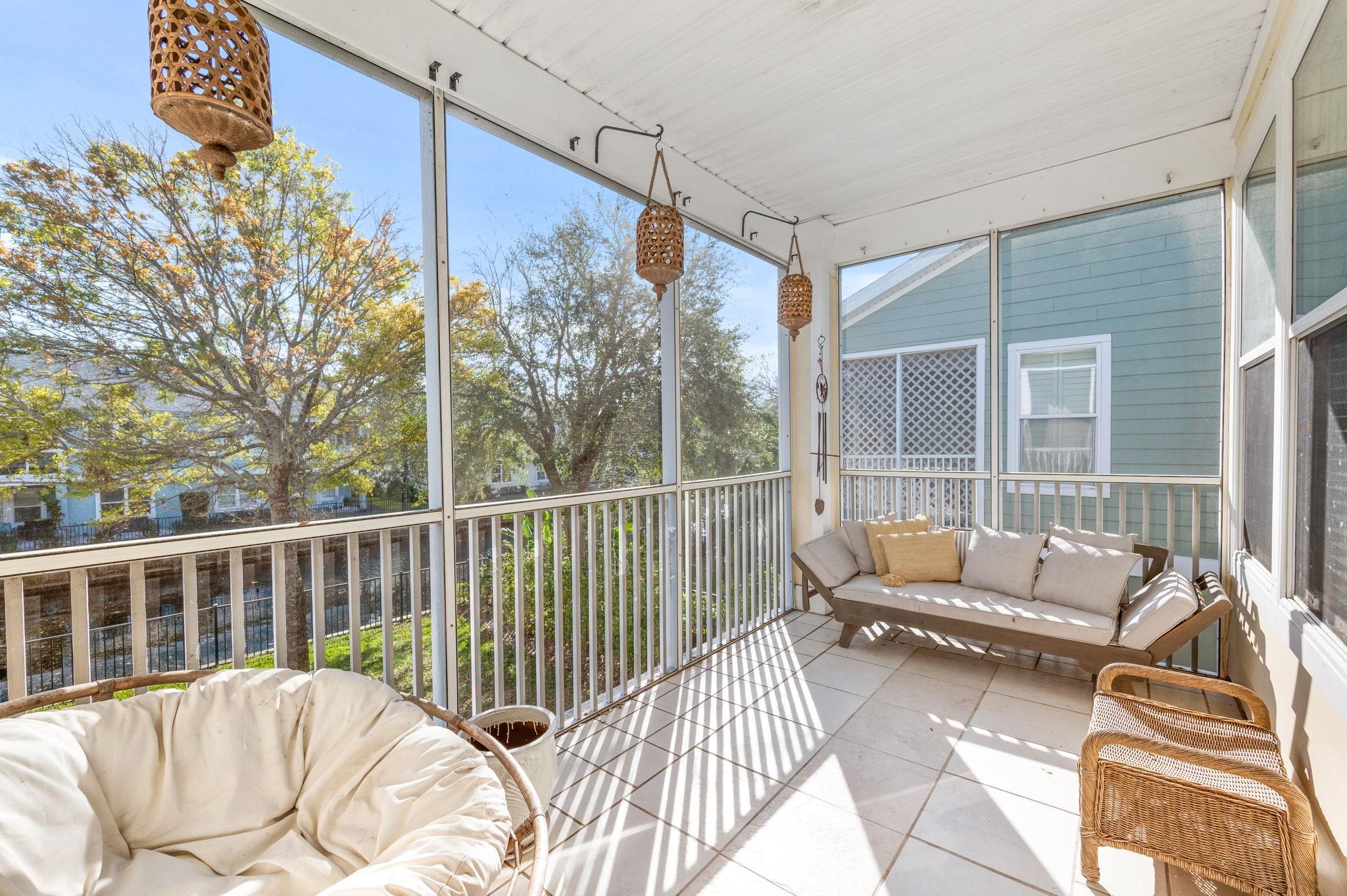 178 Sunset Circle North St. Augustine, FL 32080 - Photo 22 of 45 a view of a two couches in a balcony