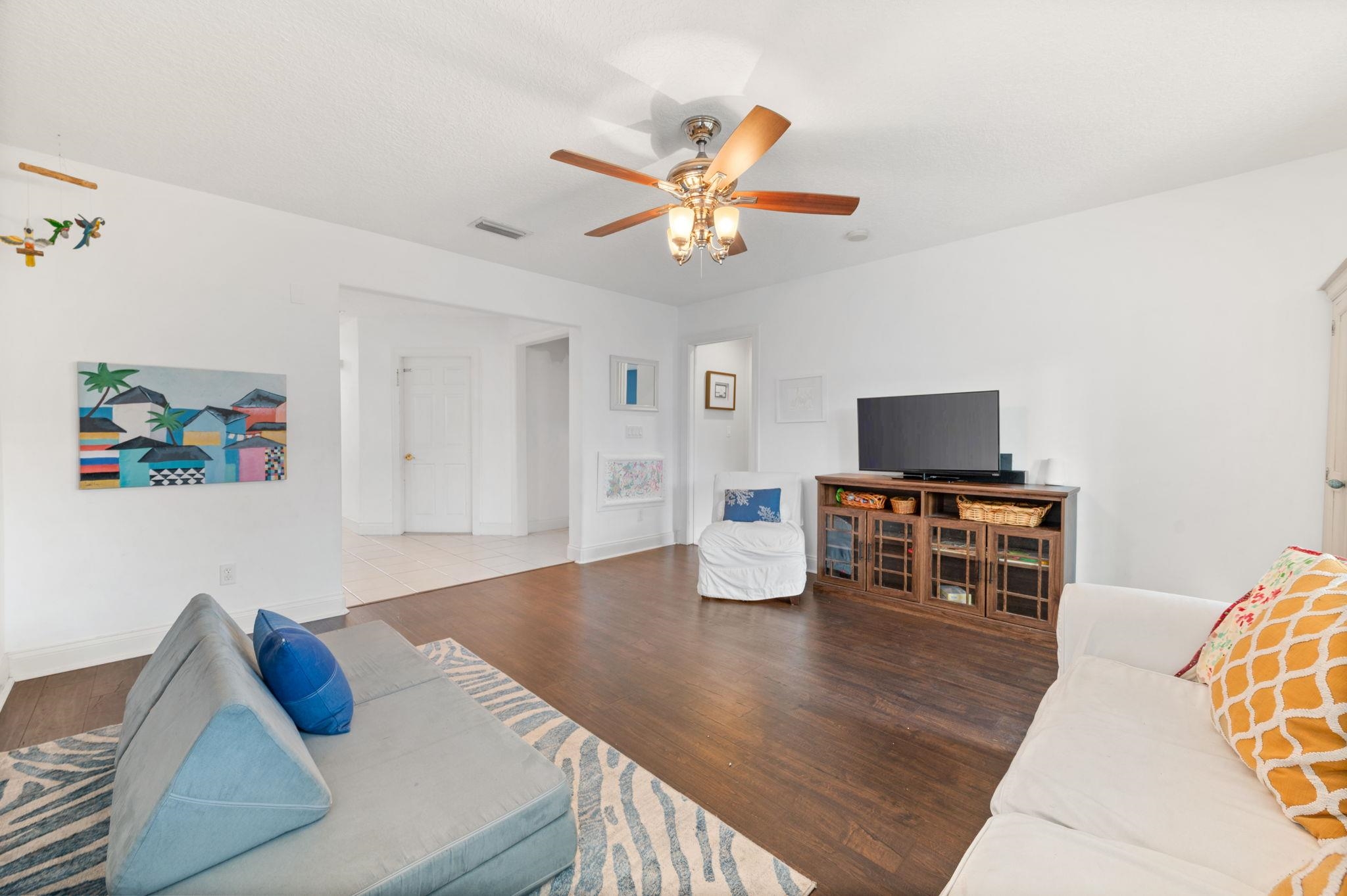 178 Sunset Circle North St. Augustine, FL 32080 - Photo 31 of 45 a living room with furniture and flat screen tv