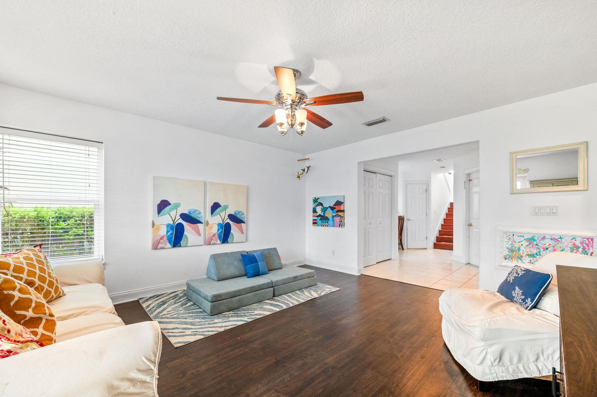 178 Sunset Circle North St. Augustine, FL 32080 - Photo 32 of 45 a living room with furniture and a flat screen tv