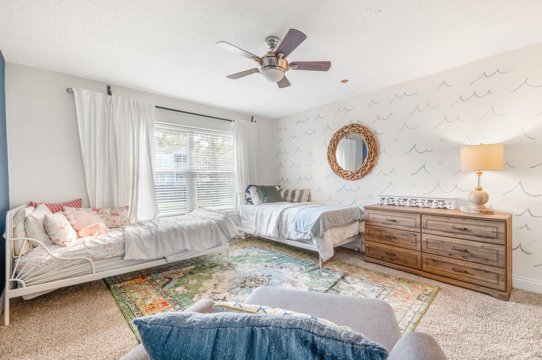178 Sunset Circle North St. Augustine, FL 32080 - Photo 36 of 45 a bedroom with a bed and window