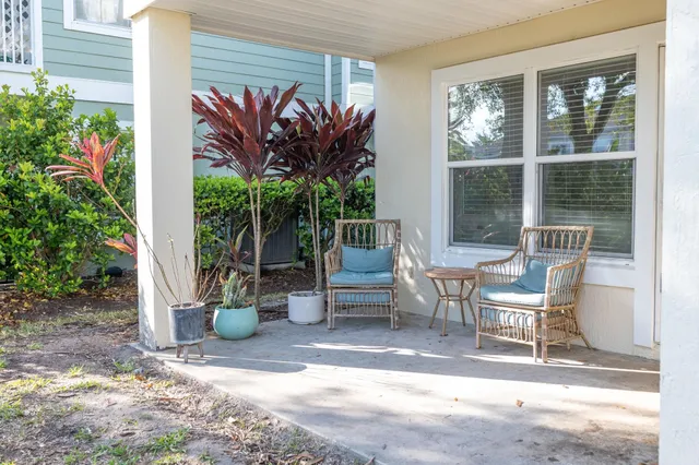 a outdoor living space with furniture and a potted plant