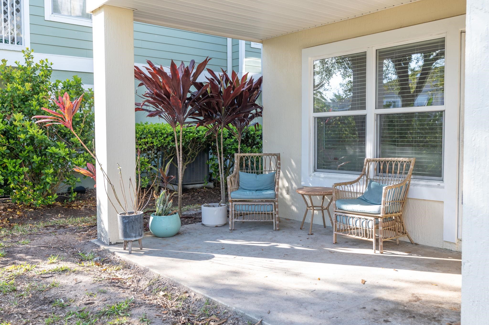 178 Sunset Circle North St. Augustine, FL 32080 - Photo 41 of 45 a outdoor living space with furniture and a potted plant