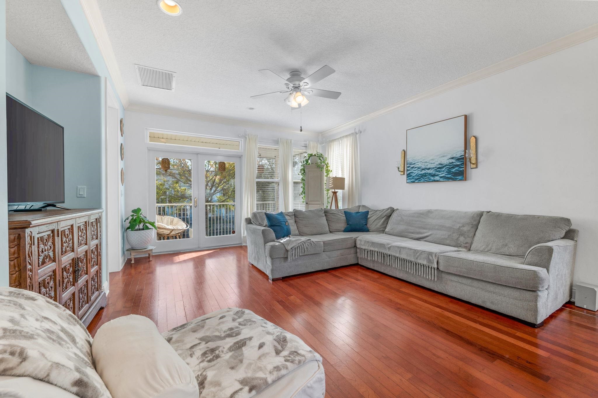 178 Sunset Circle North St. Augustine, FL 32080 - Photo 6 of 45 a living room with furniture and a flat screen tv